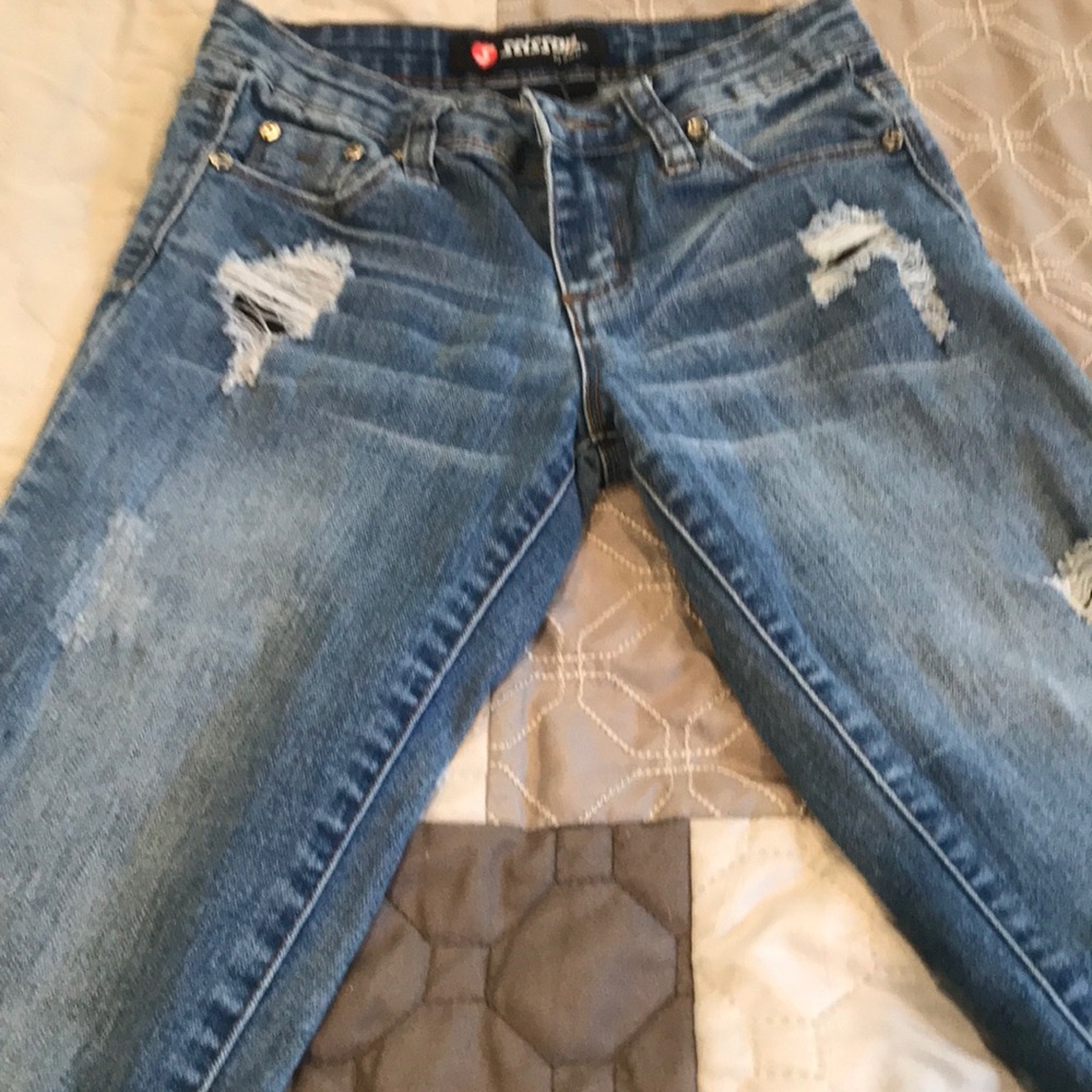 Girls distressed jeans w/ holes